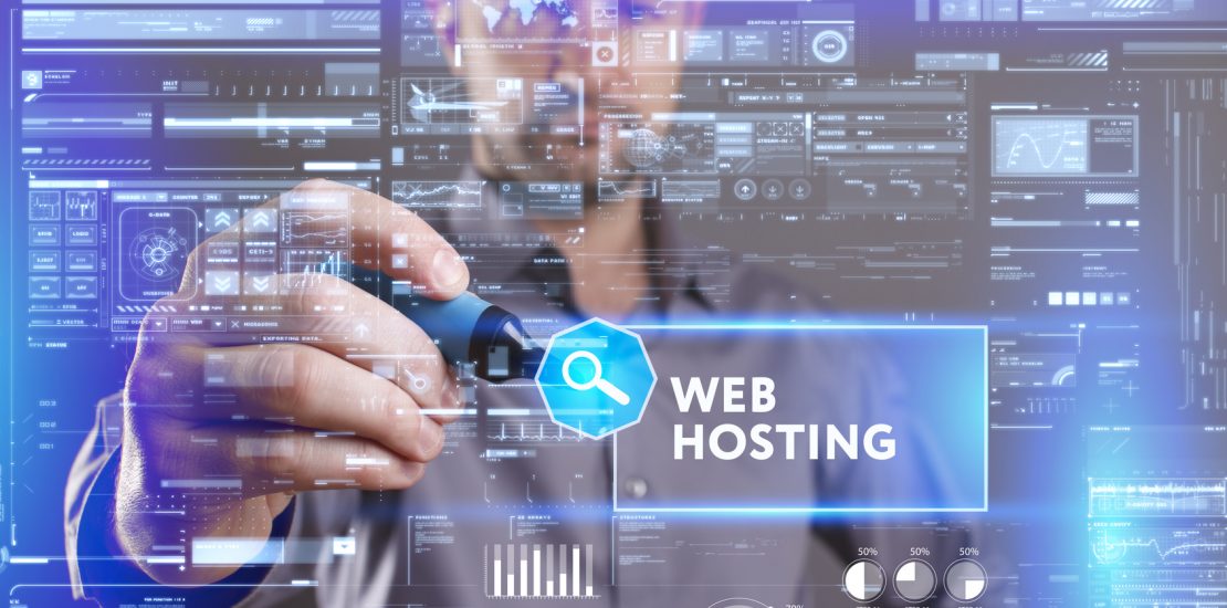 Business, Technology, Internet and network concept. Young businessman working on a virtual screen of the future and sees the inscription: Web hosting